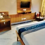 Luxury Tents: Enjoy the ultimate glamping experience with king-sized beds, luxurious washrooms, mountain views, and TVs with cable.